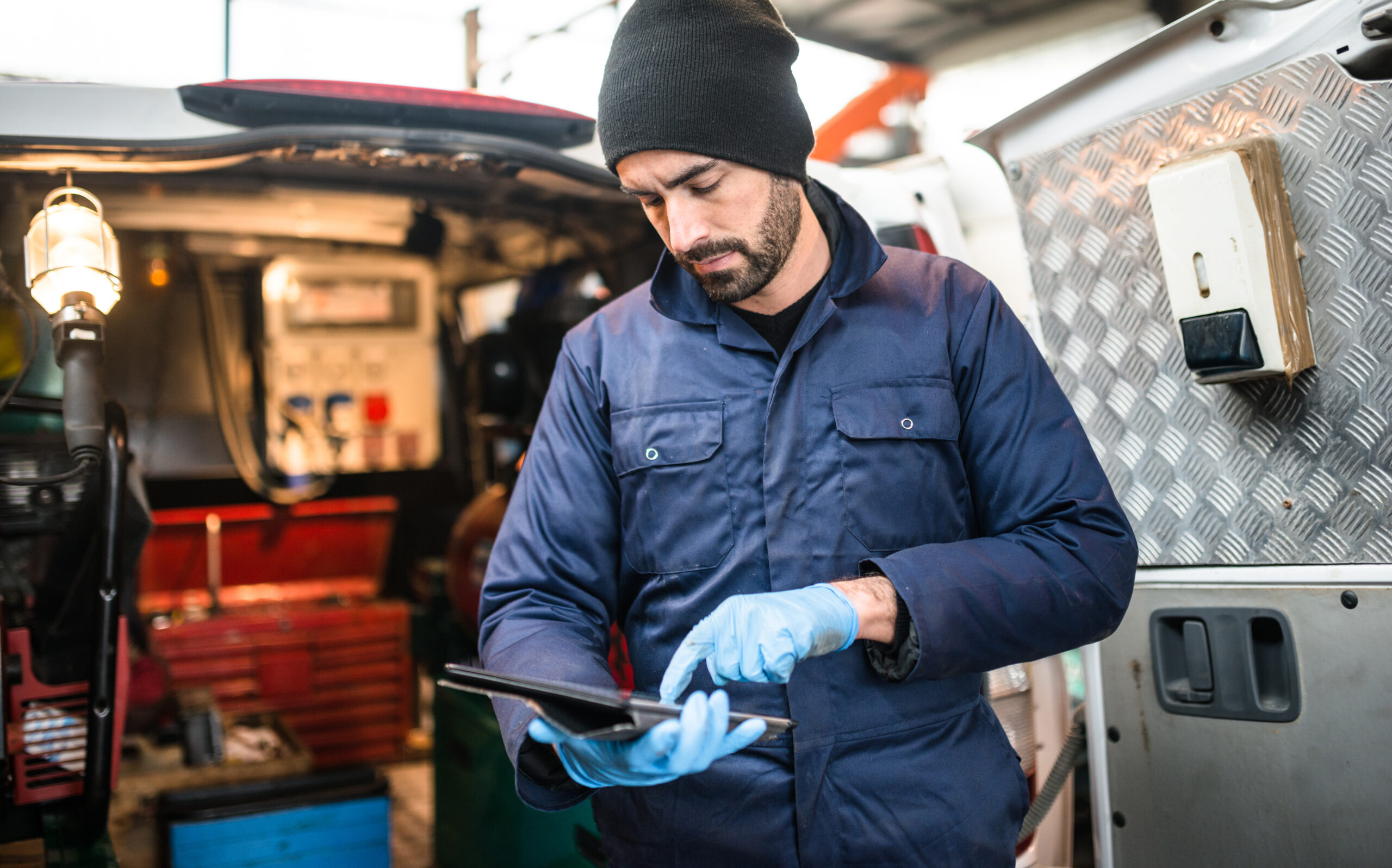 Mechanic Technician On A Garage