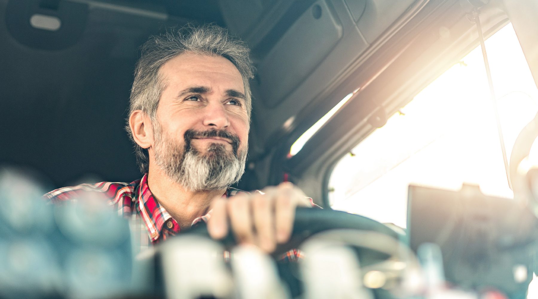 Fleet driver behind the wheel of a commercial vehicle